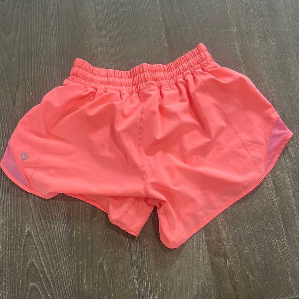 Lululemon peach colored shorts.